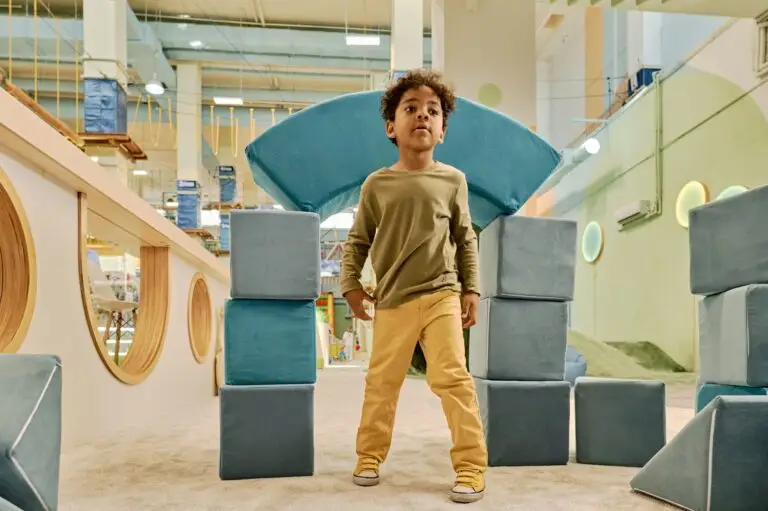 Cute boy playing with soft cubes Cute boy playing with soft cubes